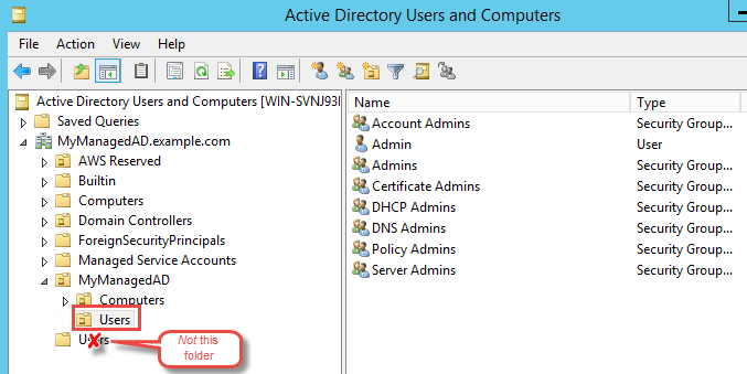 
                                        In the Active Directory Users and Computers dialog box, the Users folder is highlighted.
                                    