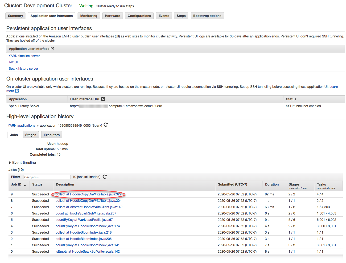 YARN application details showing job history with completed Spark tasks and their statuses.