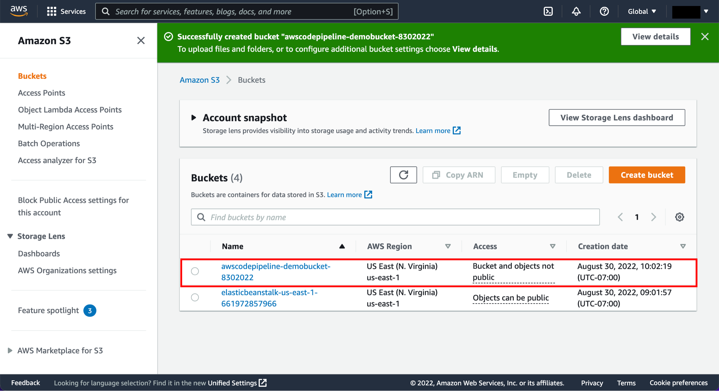 The AWS S3 console showing a successfully created bucket notification and a list of buckets with details including name, region, access settings, and creation date.