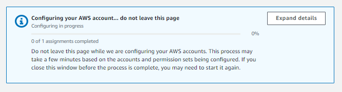 Configuration progress screen for AWS account setup, showing 0% completion with instructions not to leave the page.