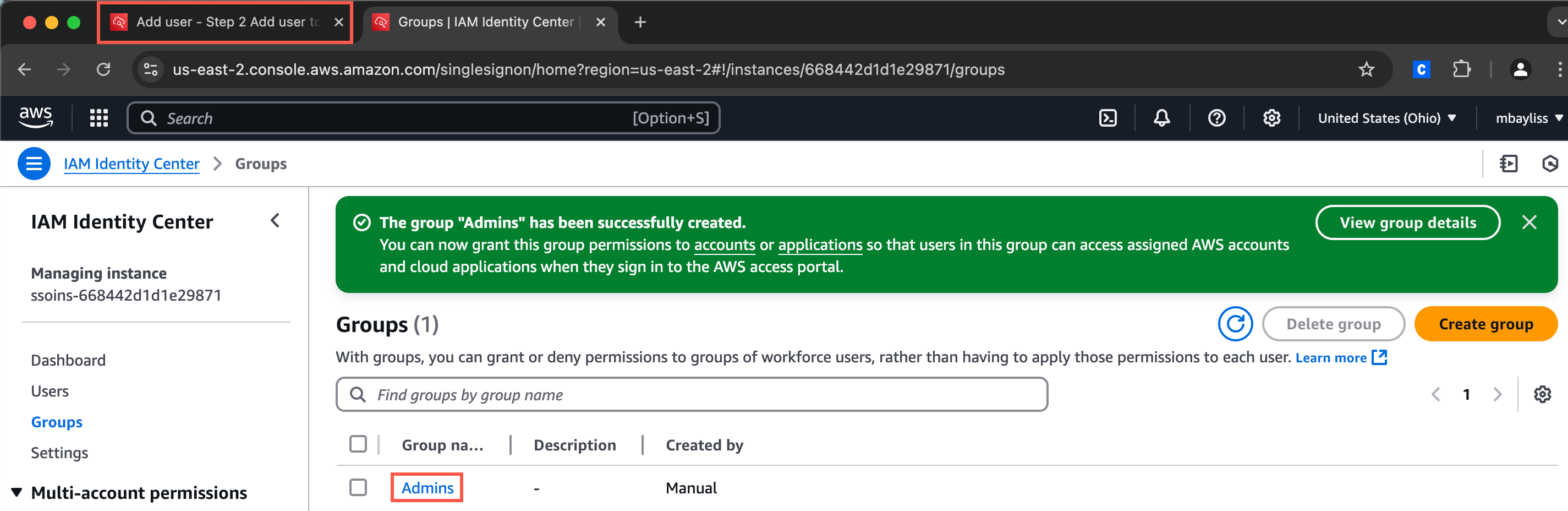 The AWS IAM Identity Center showing a confirmation message that the "Admins" group has been successfully created, with options to view group details, delete the group, or create a new group.