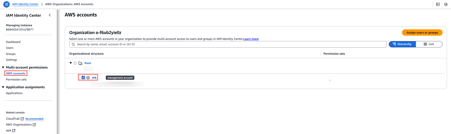 The AWS Identity Center interface showing the "AWS accounts" section with a selected management account under the organizational structure.