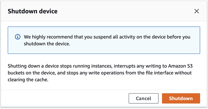 Shutdown device window showing Shutdown button at lower right.