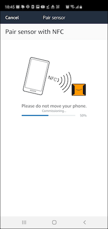 Pairing sensor with NFC, progress bar showing. (AI generated)