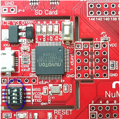 Circuit board with SD card slot, integrated circuits, and switches labeled for various functions.