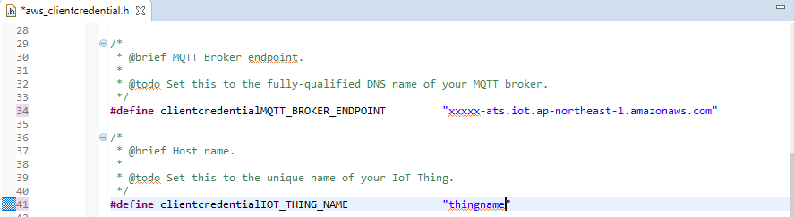 Code snippet defining MQTT broker endpoint and IoT thing name variables.